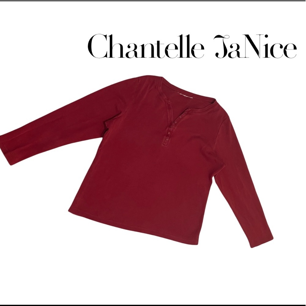 Mid sleeve length Half-button shirt. Red. Size small.